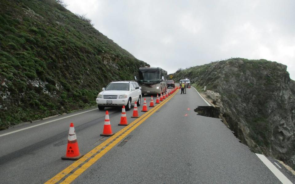 Vehicles drive north in a convoy on Highway 1 in Big Sur on March 31, 2024, after a chunk of the southbound lane fell into the sea south of the Rocky Creek Bridge. Caltrans