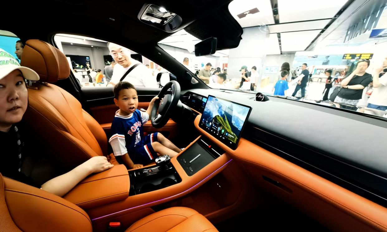 <span>There were 6.8m electric vehicle sales in in China in 2022, a huge rise from 1.3m in 2021.</span><span>Photograph: NurPhoto/Getty Images</span>