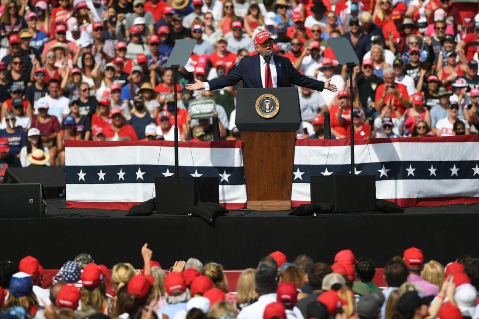 President Trump holds a rally in a parking lot at Raymond James Stadium in Tampa October 29. His plans for a Nov. 1 late-night rally in Opa-locka sets up a violation of Miami-Dade’s midnight curfew if there isn’t a change in the rules or his schedule.