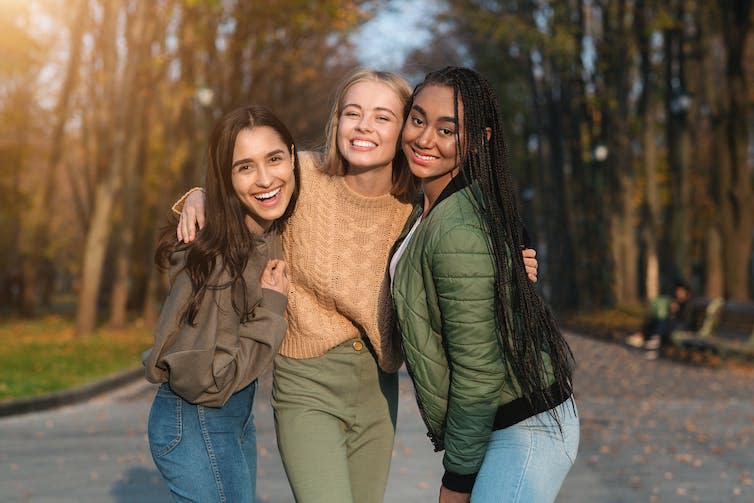 Three girls outside in warm clothes