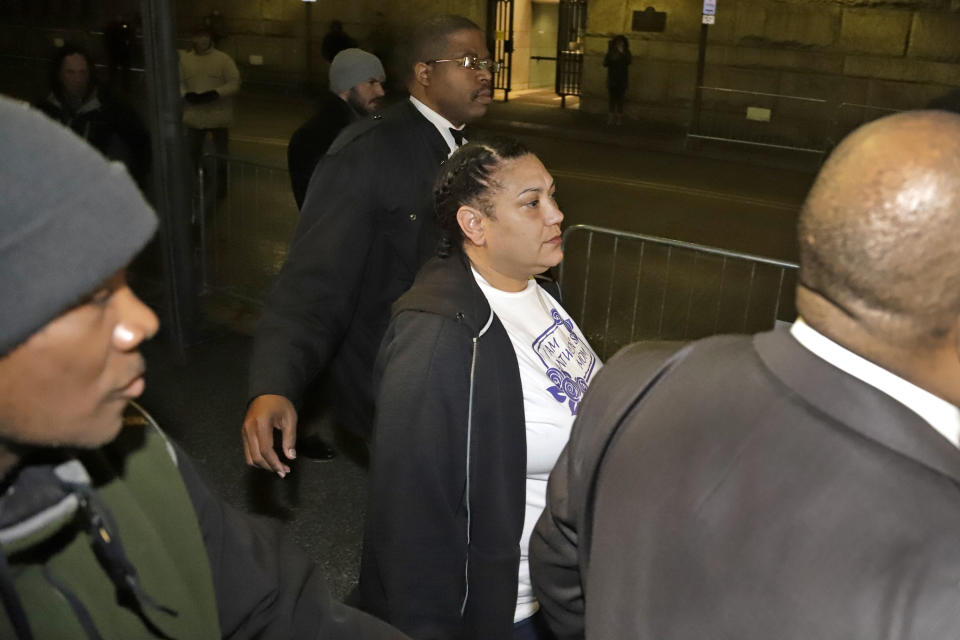 Michelle Kenney, center, the mother of Antwon Rose II, leaves the Allegheny County Courthouse with supporters after hearing the verdict of not guilty on all charges for Michael Rosfeld, a former police officer in East Pittsburgh, Pa., Friday, March 22, 2019. Rosfeld was charged with homicide in the fatal shooting of Antwon Rose II as he fled during a traffic stop on June 19, 2018. (AP Photo/Gene J. Puskar)