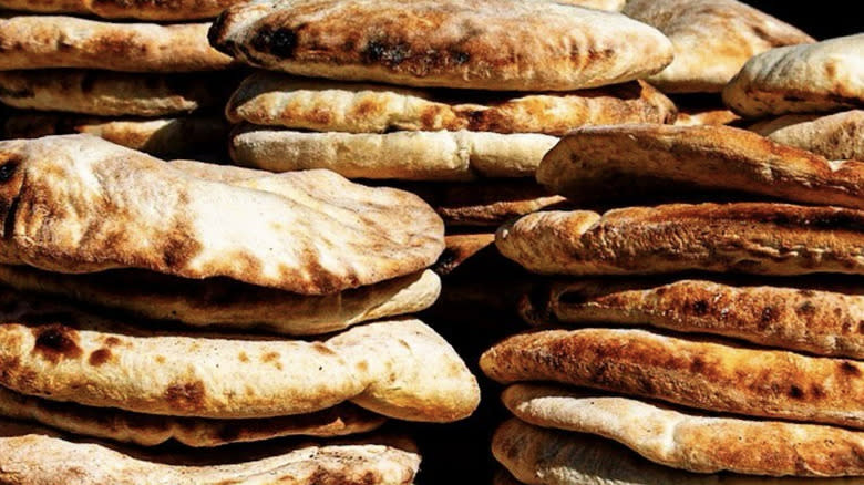 Flatbreads on background