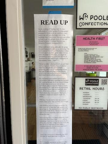 Wm. Poole Confections owners have a notice posted, seen Tuesday, July 25, 2023, about the homophobic attacks they allege at their business at 58 High St. in Somersworth, which has now closed.