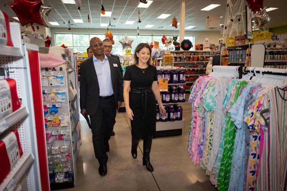 CDC Director Mandy Cohen walks to the pharmacy with Newton Walker, CVS Pharmacy district leader, during a visit to CVS Pharmacy on Monday, Oct. 16, 2023, located on SW 40th Street in Miami.