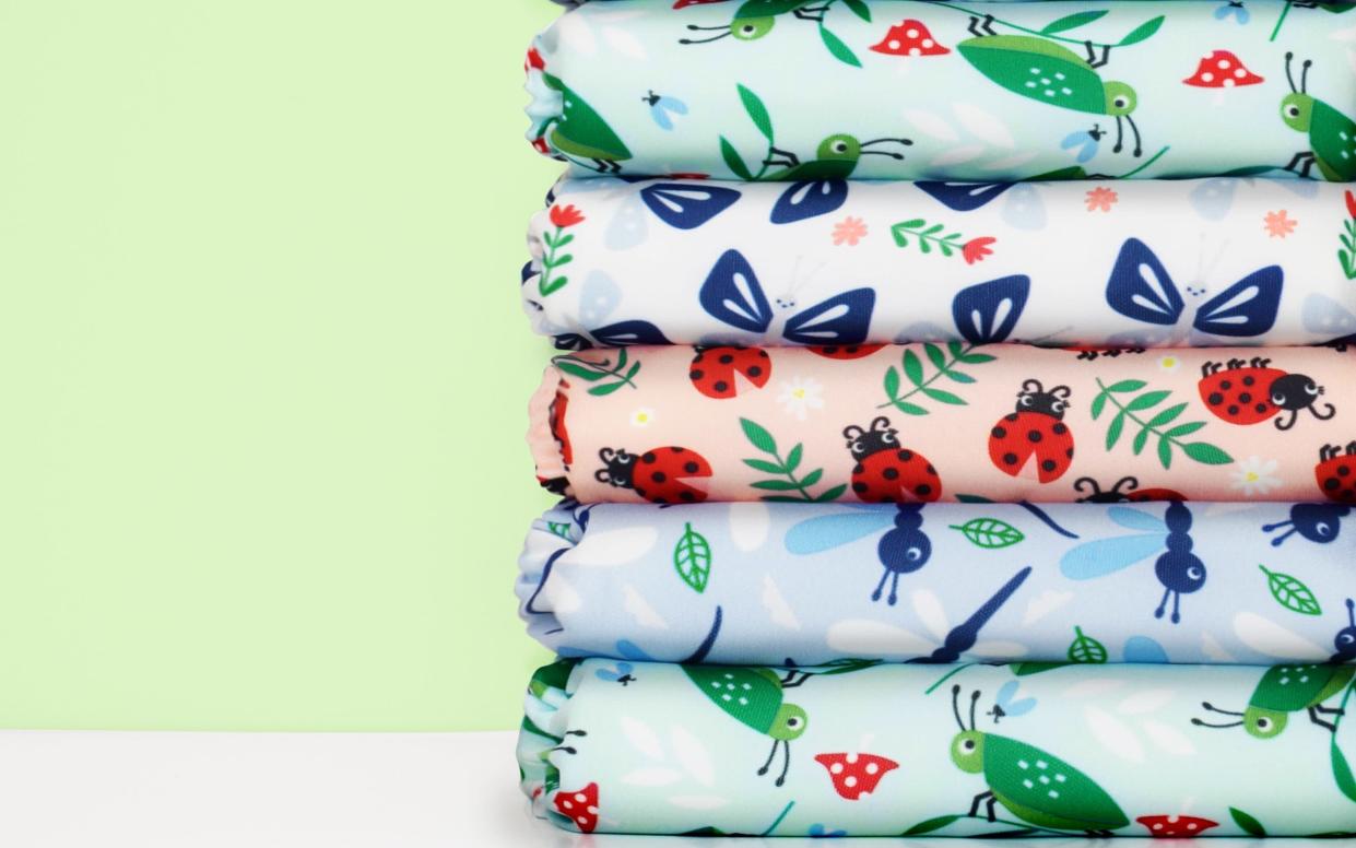 Some environmentally-conscious friendly parents are coughing up more than £100 for trendy nappy designs - Bambino Mio