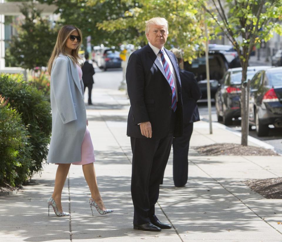 <p>Melania paired a pastel dress with a soft Max Mara top coat and light Jimmy Choo pumps as she left a church service alongside her husband in September 2017.</p>