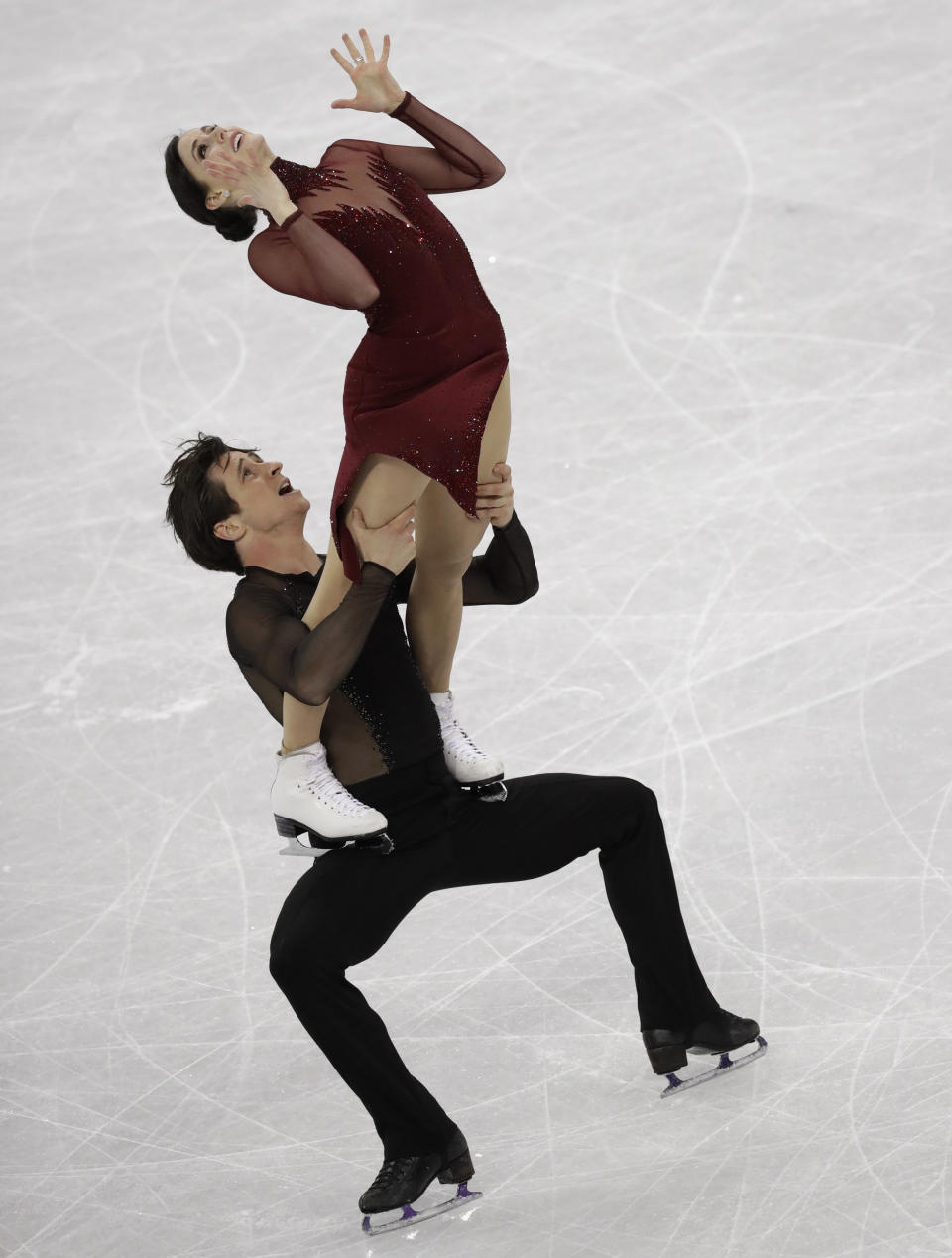 <p>Tessa Virtue and Scott Moir of Canada perform during the ice dance, free dance figure skating final in the Gangneung Ice Arena at the 2018 Winter Olympics in Gangneung, South Korea, Tuesday, Feb. 20, 2018. (AP Photo/Bernat Armangue) </p>