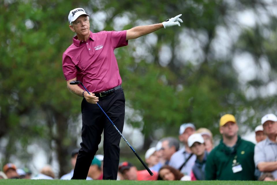 Larry Mize signals after a shot off the fourth tee at Augusta National (Getty Images)