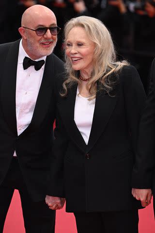 <p>Doug Peters/PA Images via Getty</p> Laurent Bouzereau and Faye Dunaway