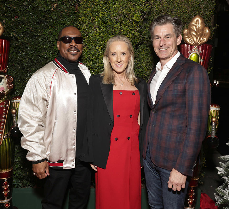 Eddie Murphy, from left, Jennifer Salke, and Mike Hopkins attend Amazon Studios Candy Cane Lane World Premiere in Los Angeles on Nov 28, 2023