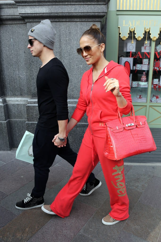 The “Love Don’t Cost A Thing” crooner was seen rocking her red Birkin during a shopping spree in London back in 2012. FilmMagic