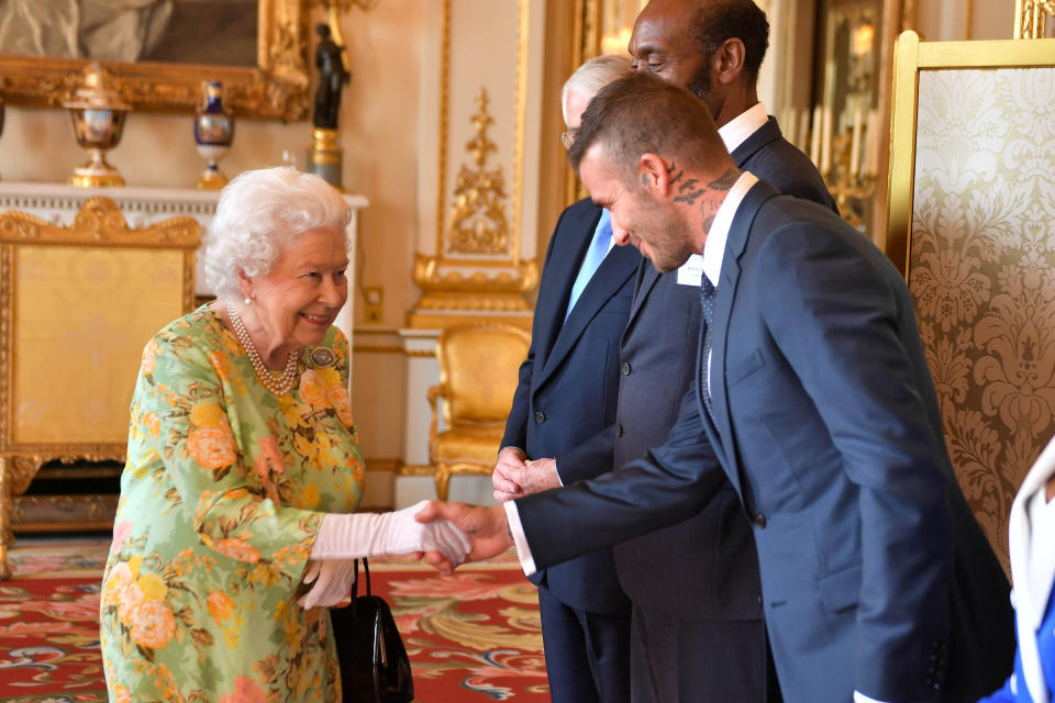 Queen Elizabeth II meets David Beckham at Buckingham Palace for the Queen's Young Leaders Awards ceremony on June 26, 2018. 