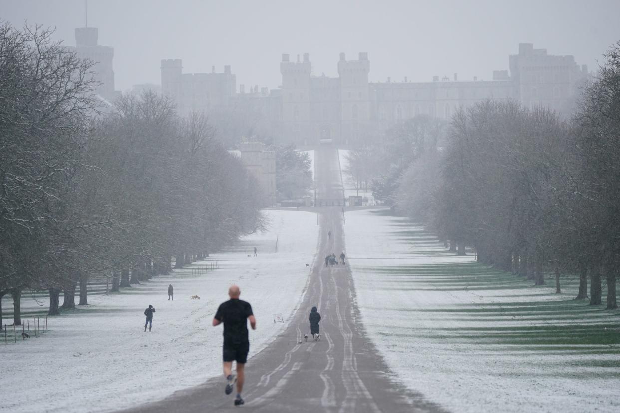 A snowy scene looking along the Long Walk towards Windsor Castle, Berkshire, as parts of the UK wake up to snow and a yellow weather warning (Yui Mok/PA Wire)