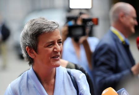 FILE PHOTO: European Competition Commissioner Margrethe Vestager arrives at an ALDE party meeting ahead of a EU leaders summit in Brussels