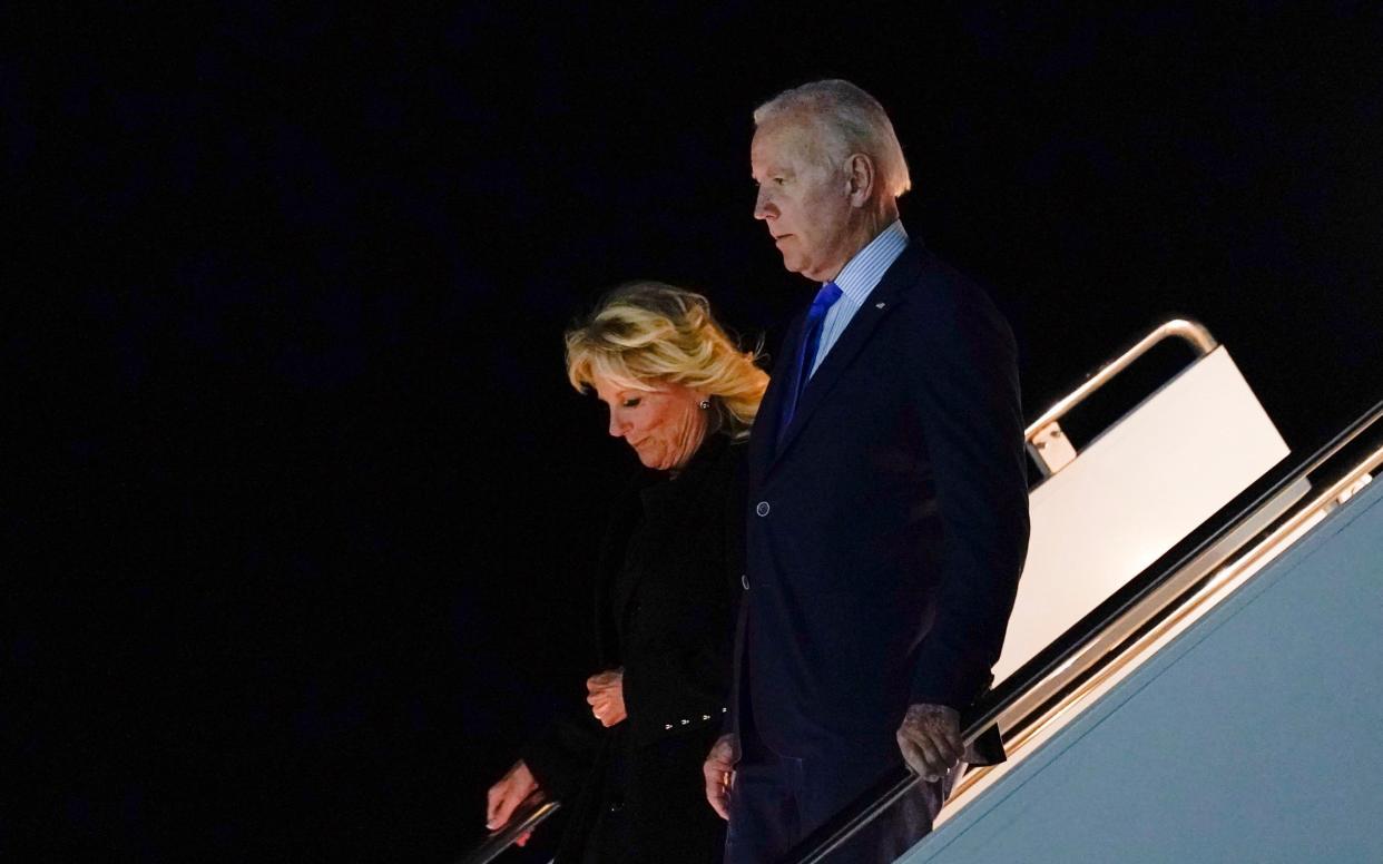 President Joe Biden and his wife Jill, the First Lady, arrive at Stansted on Saturday night - AP