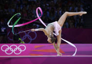 俄羅斯韻律體操女王Evgeniya Kanaeva以116.900分成為史上第一位成功衛冕韻律體操全能金牌的選手。(圖片來源：達志影像)