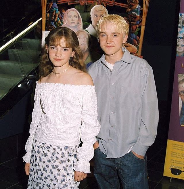 1) Tom Felton and Emma Watson