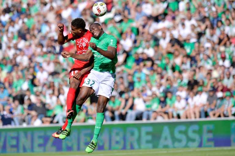 Montpellier's French forward Steve Mounie (L) scored his first Ligue 1 goal against Saint-Etienne