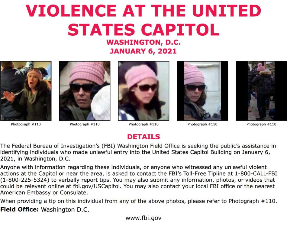 The feds are looking to identify a woman Internet sleuths are calling "Bullhorn Lady," who was captured on video feeding insurrectionists information about the layout of the Capitol. (Photo: FBI)