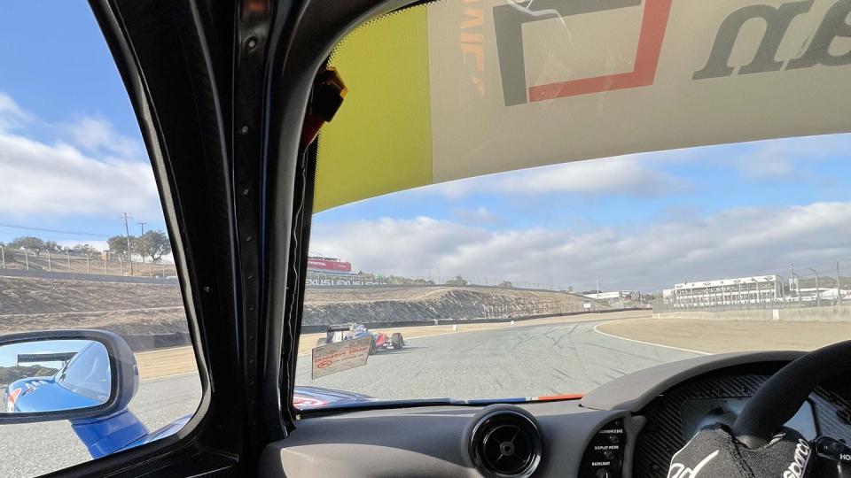 a view of a road from inside a car