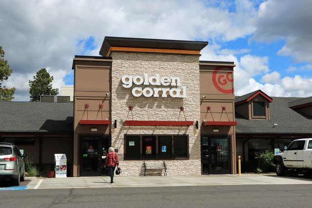 <p>Don and Melinda Crawford/UCG/Universal Images Group via Getty</p> Entrance to Golden Corral buffet restaurant showing company logo above entry.