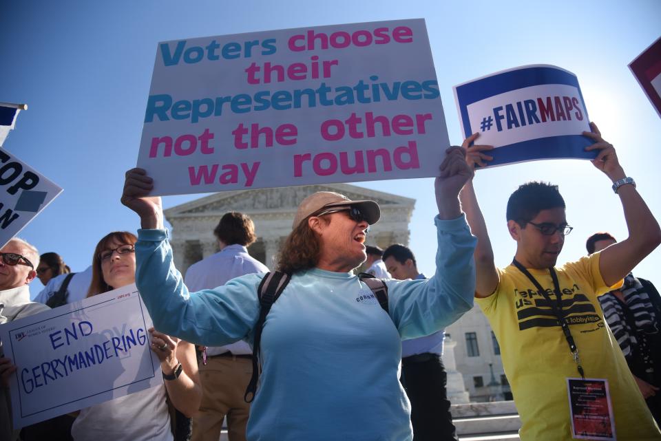 Demonstrators rally outside the Supreme Court in Washington in October 2017 during oral arguments in Gill v. Whitford case to call for an end to partisan gerrymandering. (Photo: Olivier Douliery/Getty Images)