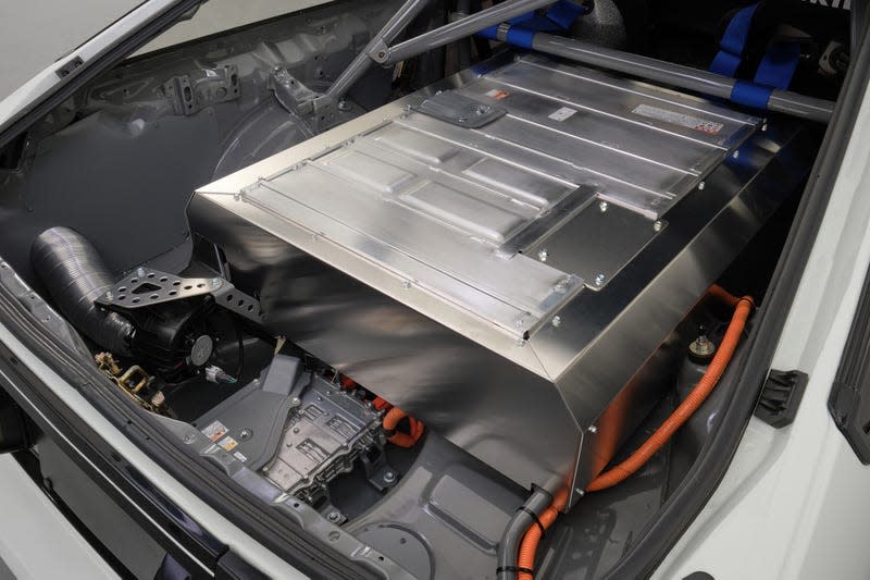 View of the battery pack inside the trunk, extending in place of the rear seats in the AE86 EV Concept.