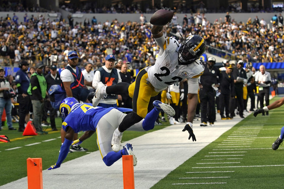 Pittsburgh Steelers running back Najee Harris, falls just short of a touchdown after jumping over Los Angeles Rams safety Jordan Fuller during the second half of an NFL football game Sunday, Oct. 22, 2023, in Inglewood, Calif. (AP Photo/Gregory Bull)
