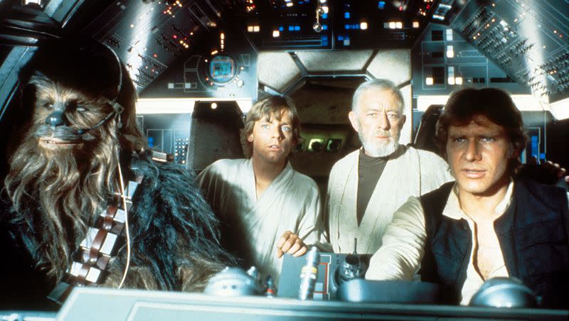 From left to right, Chewbacca (Peter Mayhew), Luke Skywalker (Mark Hamill), Obi Wan Kenobi (Alec Guinness) and Han Solo (Harrison Ford) are aboard the Millennium Falcon in the hit 1977 film “Star Wars: A New Hope.”