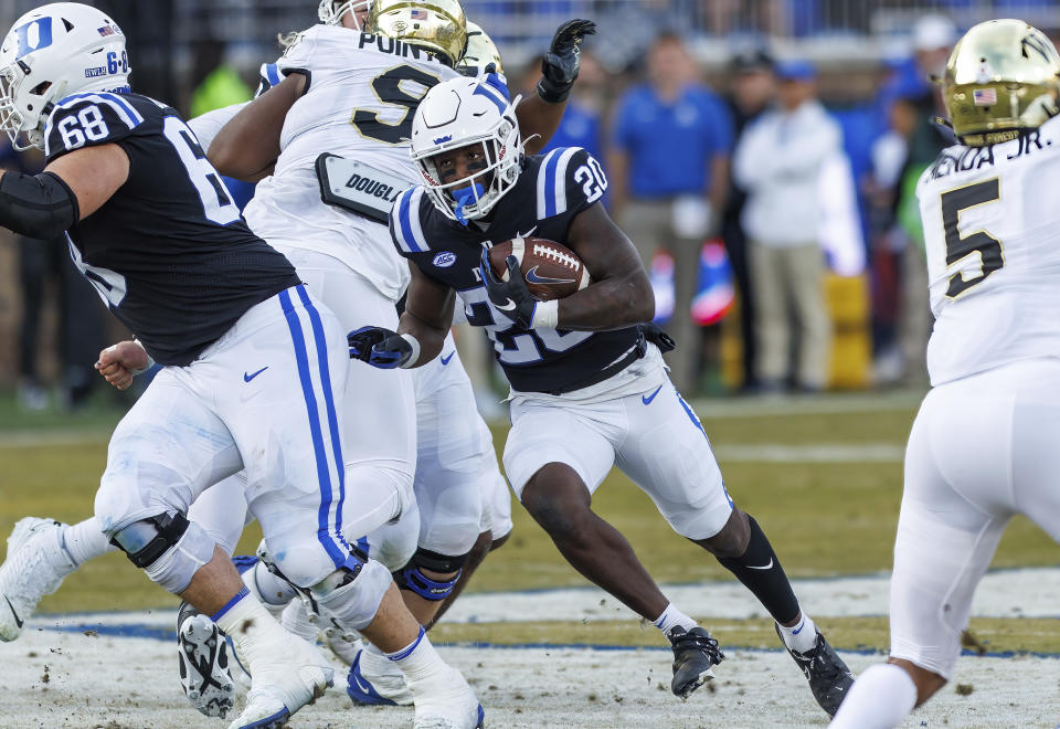 Duke's Jaquez Moore carries the ball during the first half of an NCAA college football game against Wake Forest in Durham, N.C., Saturday, Nov. 26, 2022. (AP Photo/Ben McKeown)