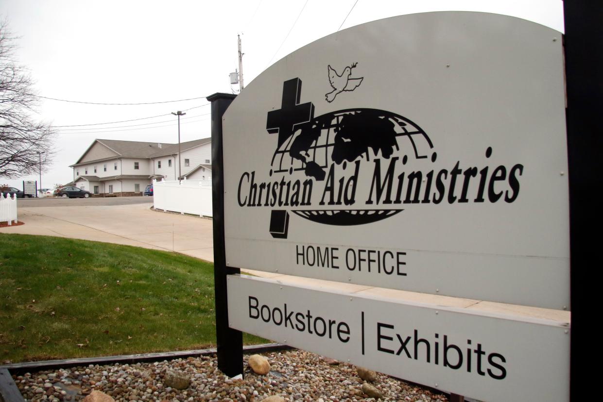 A sign for the Christian Aid Ministries offices is shown in Berlin, Ohio Thursday, Dec. 16. 