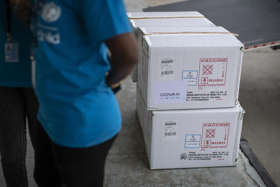 FILE - In this March 4, 2021, file photo, empty boxes used for the transport of AstraZeneca COVID-19 vaccine manufactured by the Serum Institute of India, after the vaccines were put into refrigerated storage units in Kitengela town on the outskirts of Nairobi, in Kenya. The stark vaccine access gap is prompting increased calls across the world for the U.S. to start shipping vaccine supplies to poorer countries. (AP Photo/Ben Curtis, File)