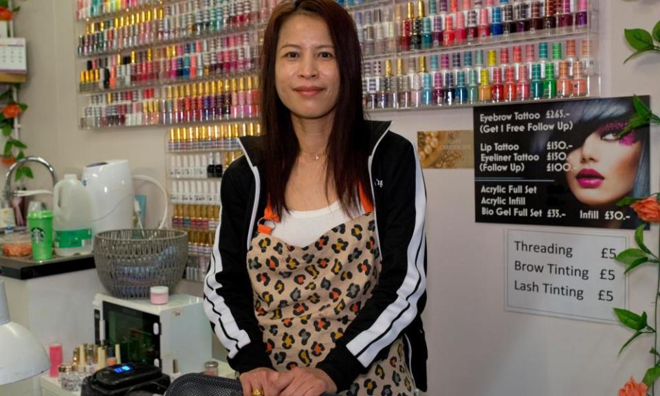 Tanjira Busbui, 45, a nail technician, in her shop