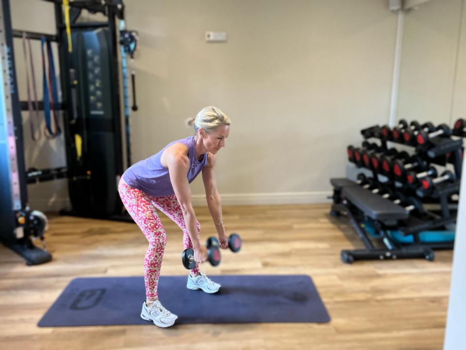 Caroline Idiens performs bent-over row