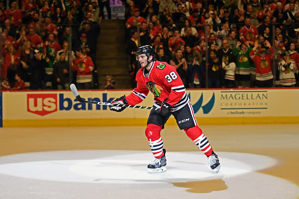 CHICAGO, IL - MARCH 21: Chicago Blackhawks left wing Ryan Hartman (38) celebrates his goal during a game between the Vancouver Canucks and the Chicago Blackhawks on March 21, 2017, at the United Center in Chicago, IL. Canucks won 5-4 in overtime. (Photo by Patrick Gorski/Icon Sportswire via Getty Images)