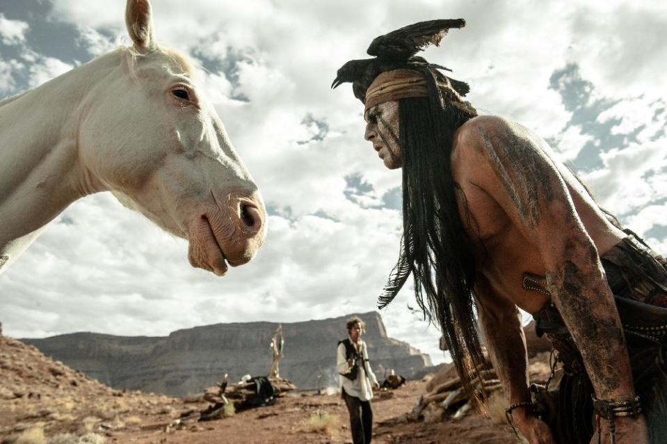 This publicity image released by Disney shows Johnny Depp as Tonto, right, and Armie Hammer as The Lone Ranger, in a scene from "The Lone Ranger." (AP Photo/Disney Enterprises, Inc. and Jerry Bruckheimer Inc., Peter Mountain)