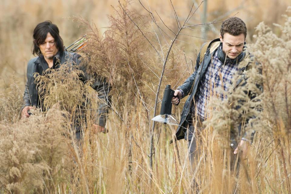 Daryl (Norman Reedus), left, and Aaron (Ross Marquand) on <em>The Walking Dead.</em> (Photo: Gene Page/AMC)