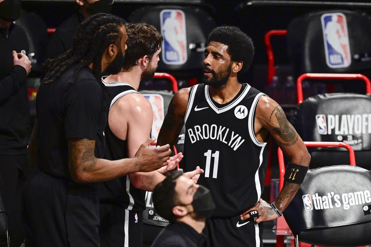 Kyrie Irving of the Brooklyn Nets on the sideline during a game last season.