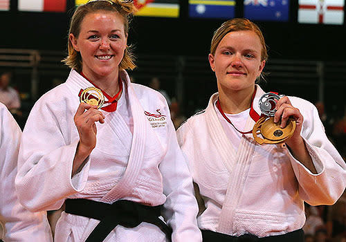 The South African-born Kiwi (pictured right) picked up her first Commonwealth Games medal at her first event., with silver in the women's 70kg class.