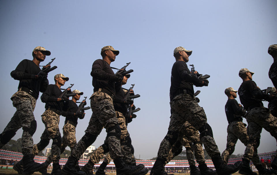 Assam smart police commandos participate in a parade to mark Republic Day in Gauhati, India, Sunday, Jan. 26, 2020. Sunday's event marks the anniversary of the country's democratic constitution taking force in 1950. (AP Photo/Anupam Nath)