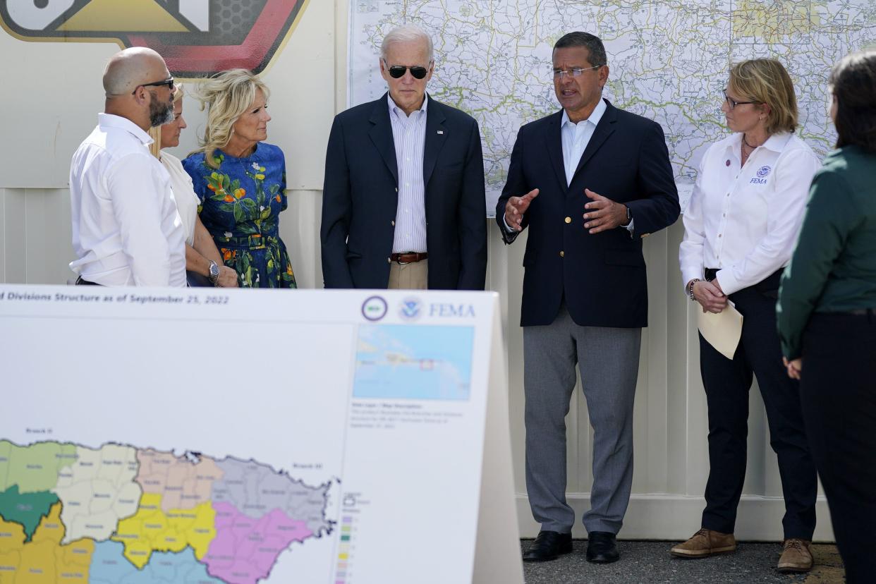 President Joe Biden and first lady Jill Biden, receive a briefing from Puerto Rico Gov. Pedro Pierluisi on Hurricane Fiona, Monday, Oct. 3, 2022, in Ponce, Puerto Rico. 