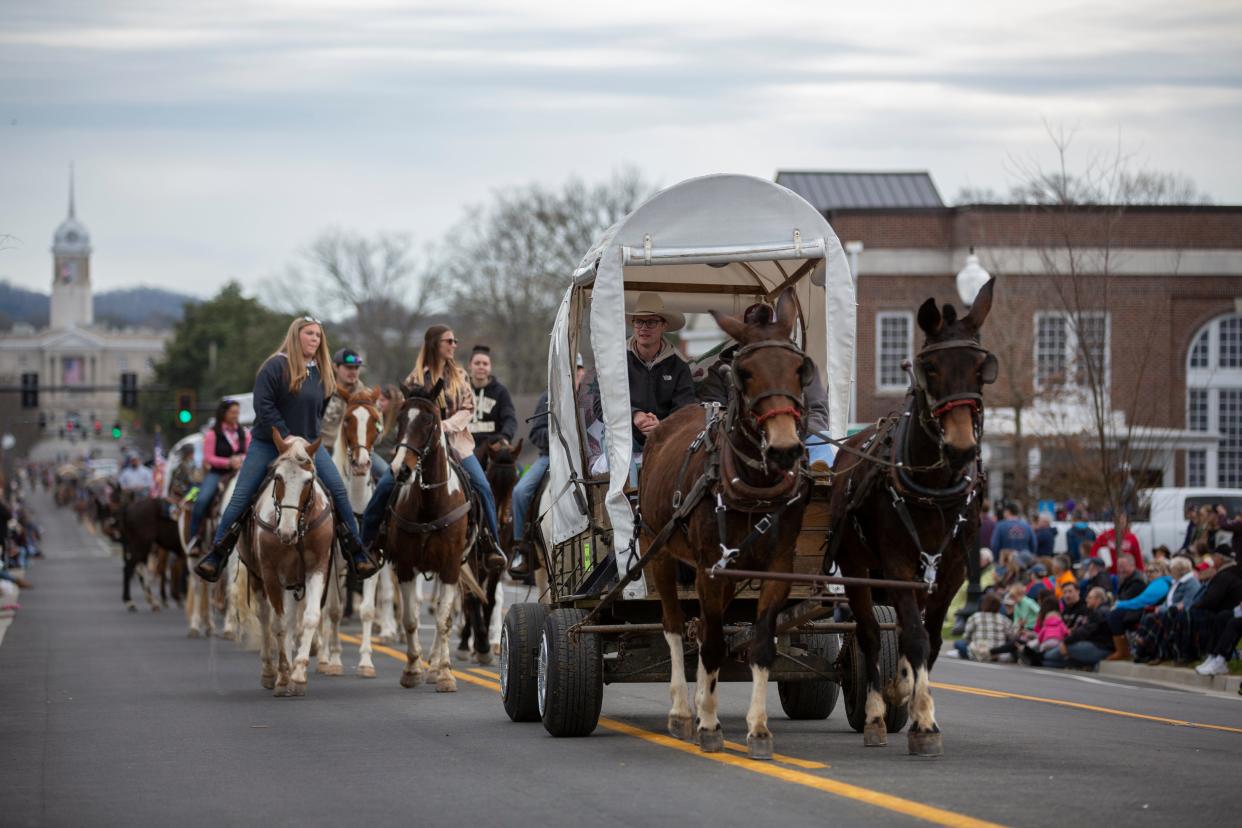The Mule Day Parade makes its way down West 7th Street in Columbia, Tenn., on Saturday, April 2, 2022. 