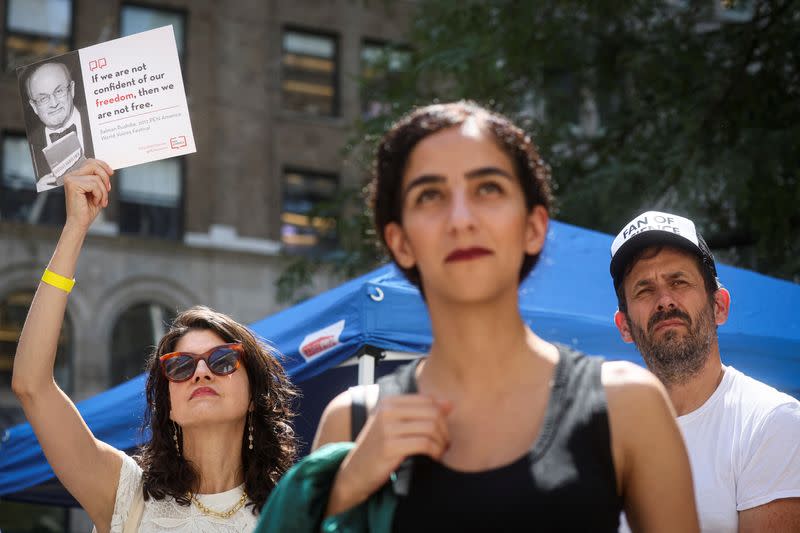 Supporters of author Salman Rushdie attend a reading and rally to show solidarity for free expression at the New York Public Library in New York