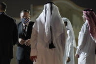 Secretary of State Mike Pompeo prepares to board a plane at Old Doha International Airport, Saturday, Nov. 21, 2020, in Doha, Qatar. Pompeo is en route to the United Arab Emirates. (AP Photo/Patrick Semansky, Pool)