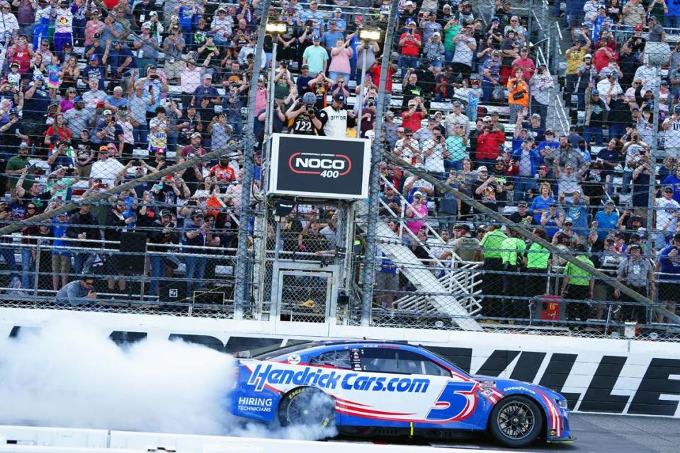 Apr 16, 2023; Martinsville, Virginia, USA; NASCAR Cup Series driver Kyle Larson (5) celebrates winning the NOCO 400 at Martinsville Speedway. Mandatory Credit: John David Mercer-USA TODAY Sports