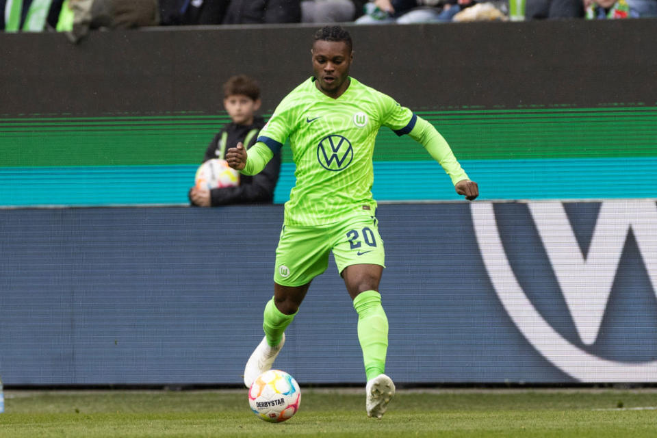 Ridle Baku of VfL Wolfsburg controls the ball during the Bundesliga match between VfL Wolfsburg and FC Augsburg at Volkswagen Arena on April 1, 2023 in Wolfsburg, Germany.