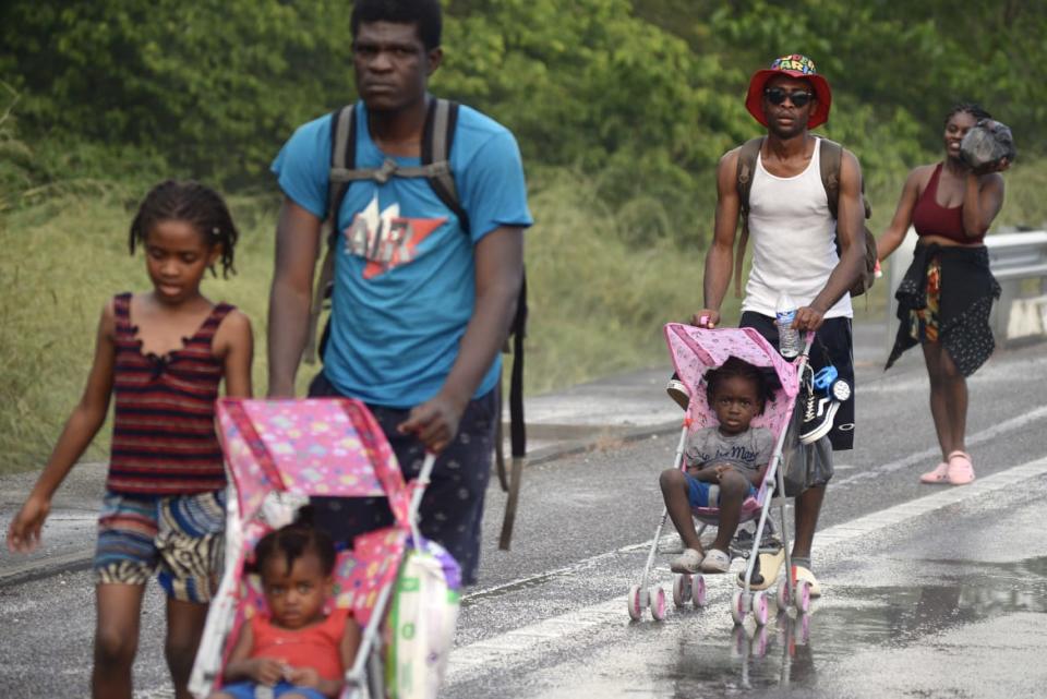 <div class="inline-image__caption"><p>A migrant caravan, mostly made up of Haitians, advances on the southern coasts of Chiapas for the fourth consecutive day as they head to the United States through Escuintla, Mexico, on Nov. 20, 2021.</p></div> <div class="inline-image__credit">Jacob Garcia/Anadolu Agency via Getty Images</div>