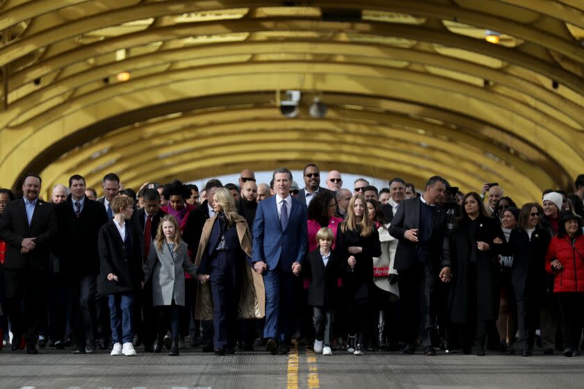 SACRAMENTO, CA - JANUARY 06: Governor Gavin Newsom in People's March on Tower Bridge during inauguration ceremony for a second term in downtown on Friday, Jan. 6, 2023 in Sacramento, CA. (Gary Coronado / Los Angeles Times)