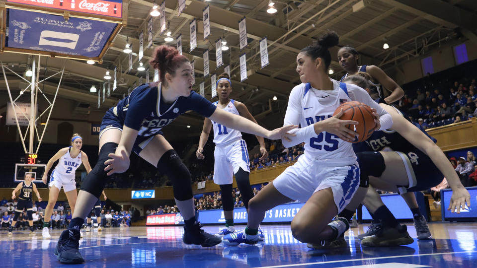 DURHAM, NC - JANUARY 26: Jade Williams #25 of Duke University beats Lorela Cubaj #13 of Georgia Tech to a loose ball during a game between Georgia Tech and Duke at Cameron Indoor Stadium on January 26, 2020 in Durham, North Carolina. (Photo by Andy Mead/ISI Photos/Getty Images)