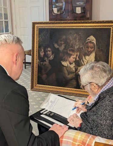 <p>FBI</p> Dr. Francis Wood, 96, signs paperwork affirming the return of an heirloom stolen from his father by mobsters in 1969.